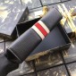 Replica Gucci Perfect Quality plain black leather purse with red Gucci Perfect Quality label GC07BM003