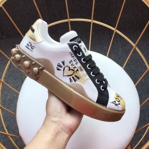 Dolce & Gabbana White and heart motif print with gold sole Sneakers MS110023